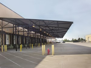 Large shade structure solution for loading decks at warehouse