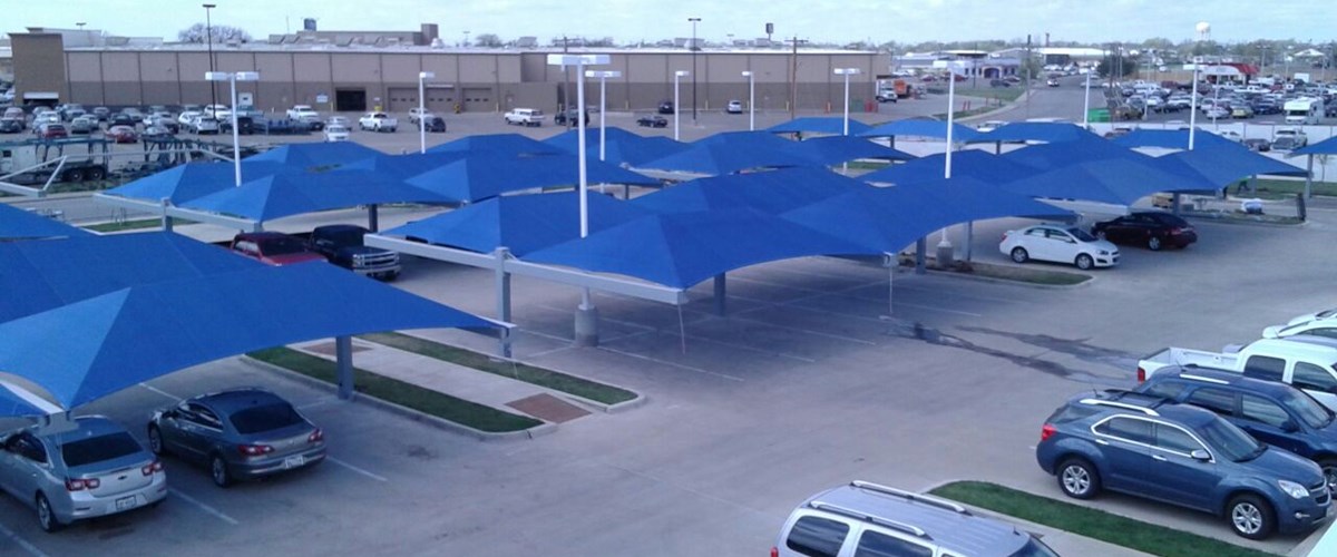 covered parking spot at auto dealership thumbnail