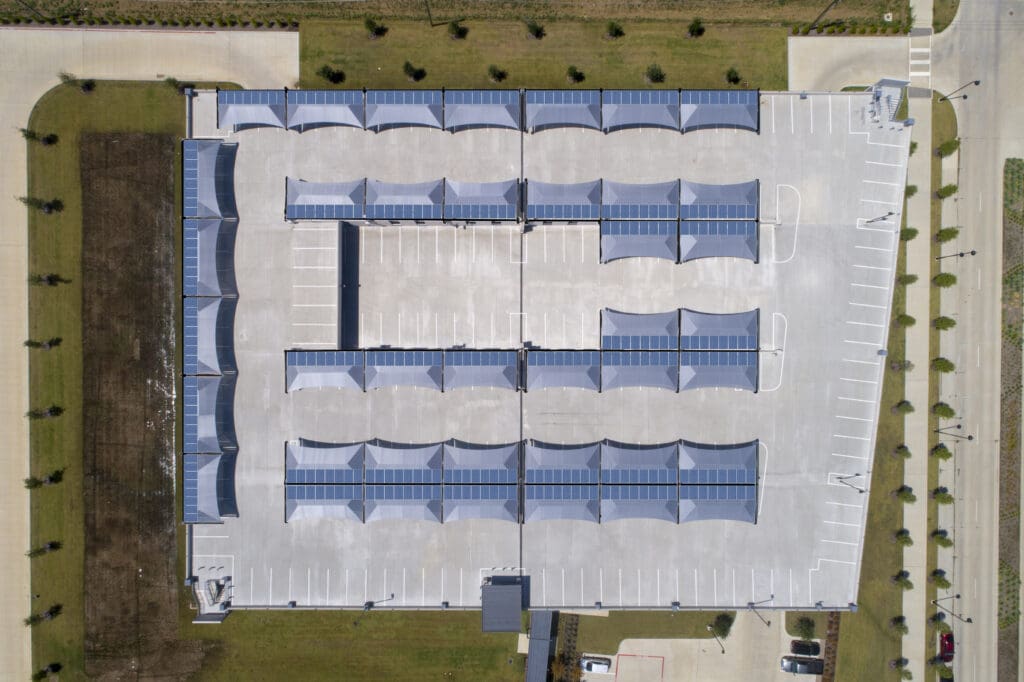 Rooftop parking with solar panels, overhead view" thumbnail