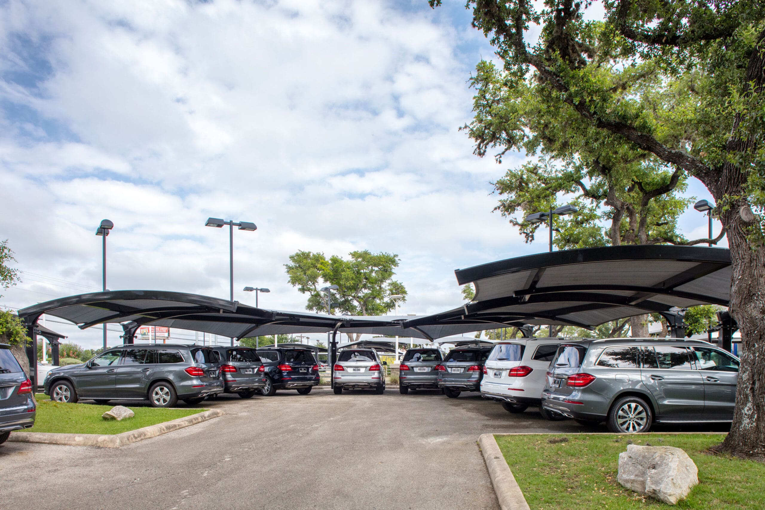 car dealership with shade structures