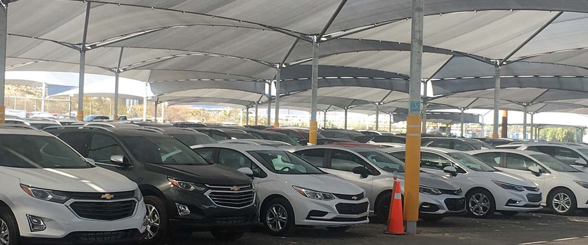 Cars parked under structure at GM Ramos Arizpe Assembly Plant 2 thumbnail