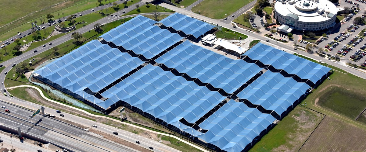 aerial view of blue airport parking shades thumbnail