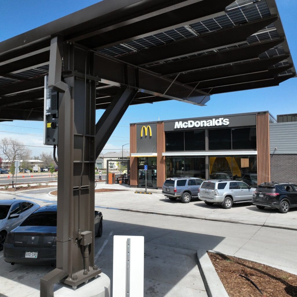 solar roof for covered parking, quick serve restaurant, street level view