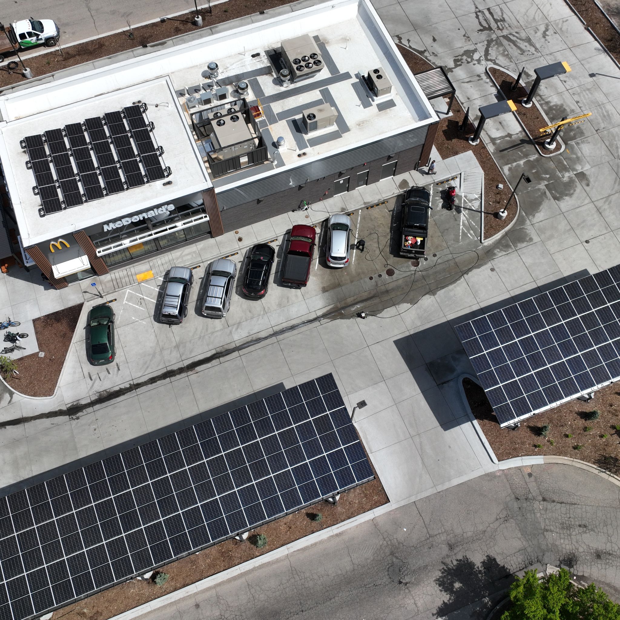 solar roof for covered parking, quick serve restaurant, aerial view thumbnail