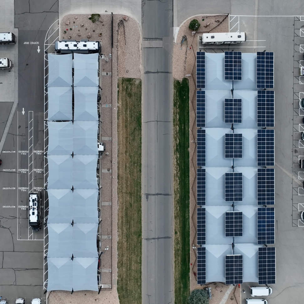 the view from overhead, RV motor homes covered by protective shade structure thumbnail