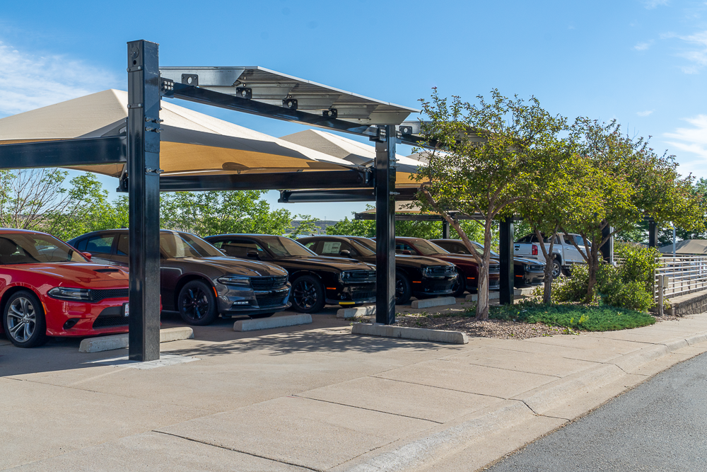 Solar Integrated Hail Protection Structures at a Dodge Ram auto dealership