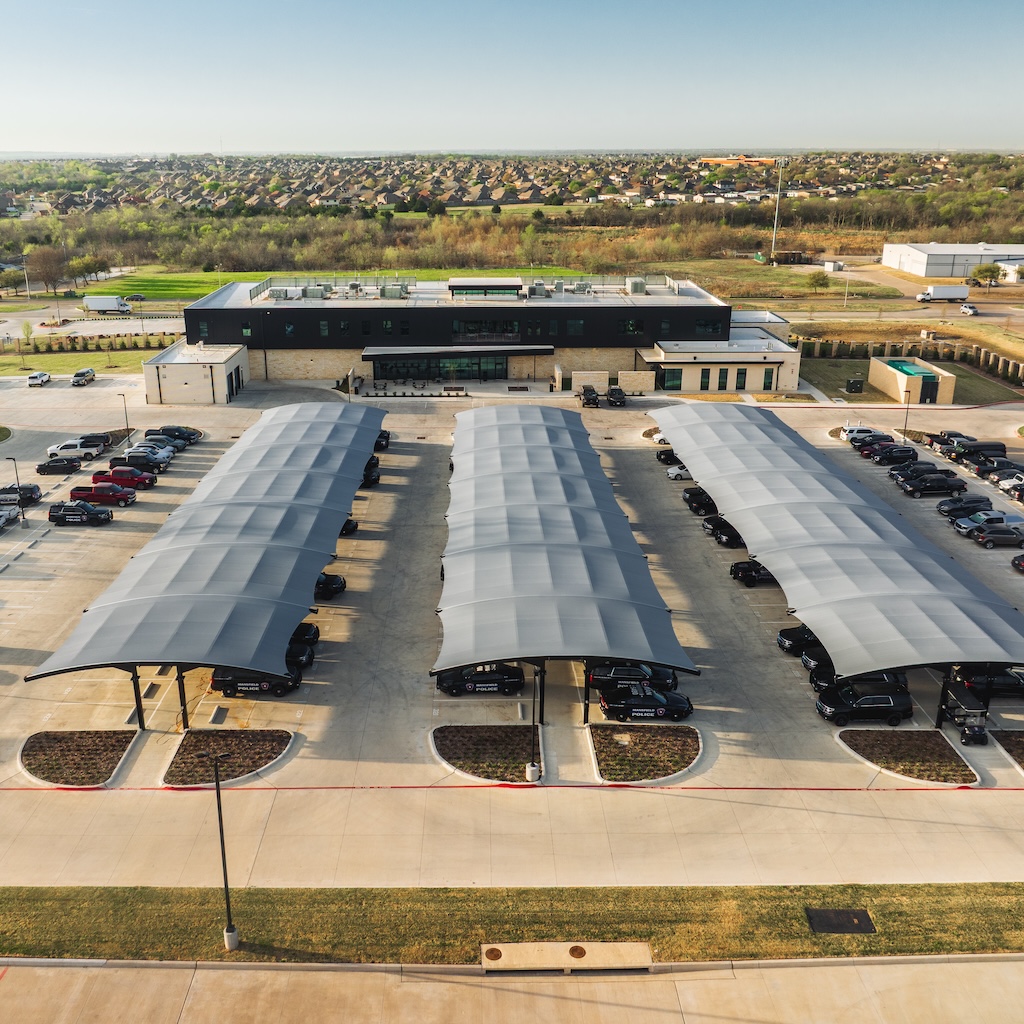 Mansfield Police Department, aerial view of parking lot with protective structures for vehicles thumbnail