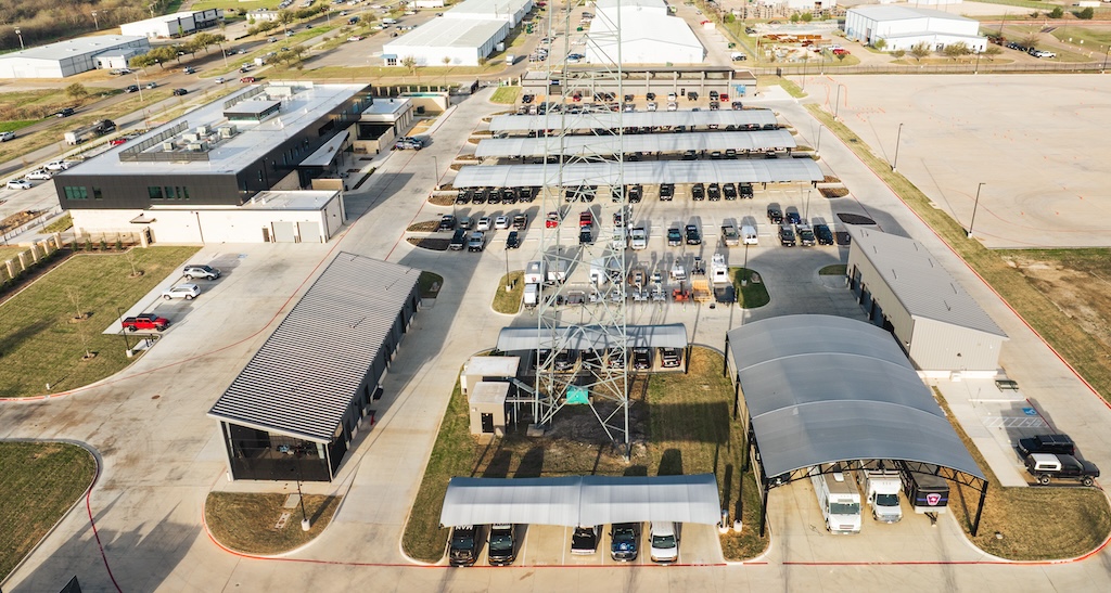 Mansfield Police Department, aerial view of parking lot with protective structures for vehicles, all structures in view