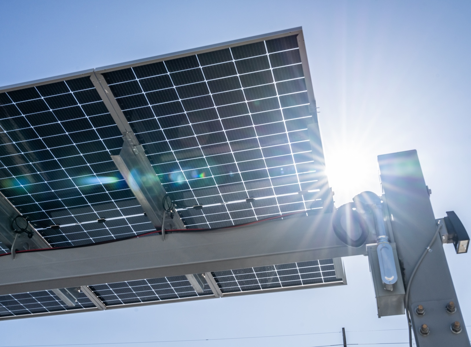 looking skyward at a solar panel thumbnail
