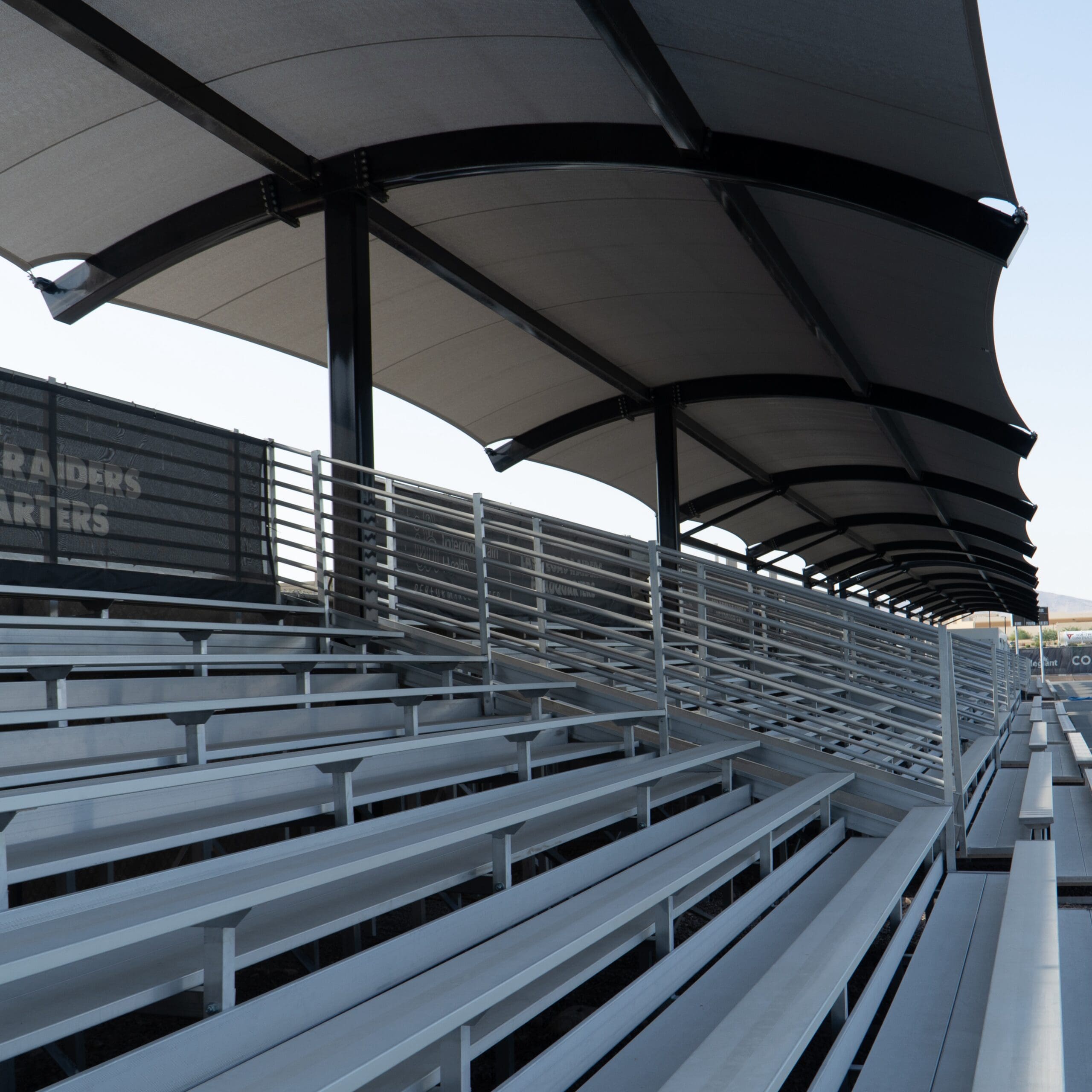 shade structure for bleachers at NFL training facility thumbnail