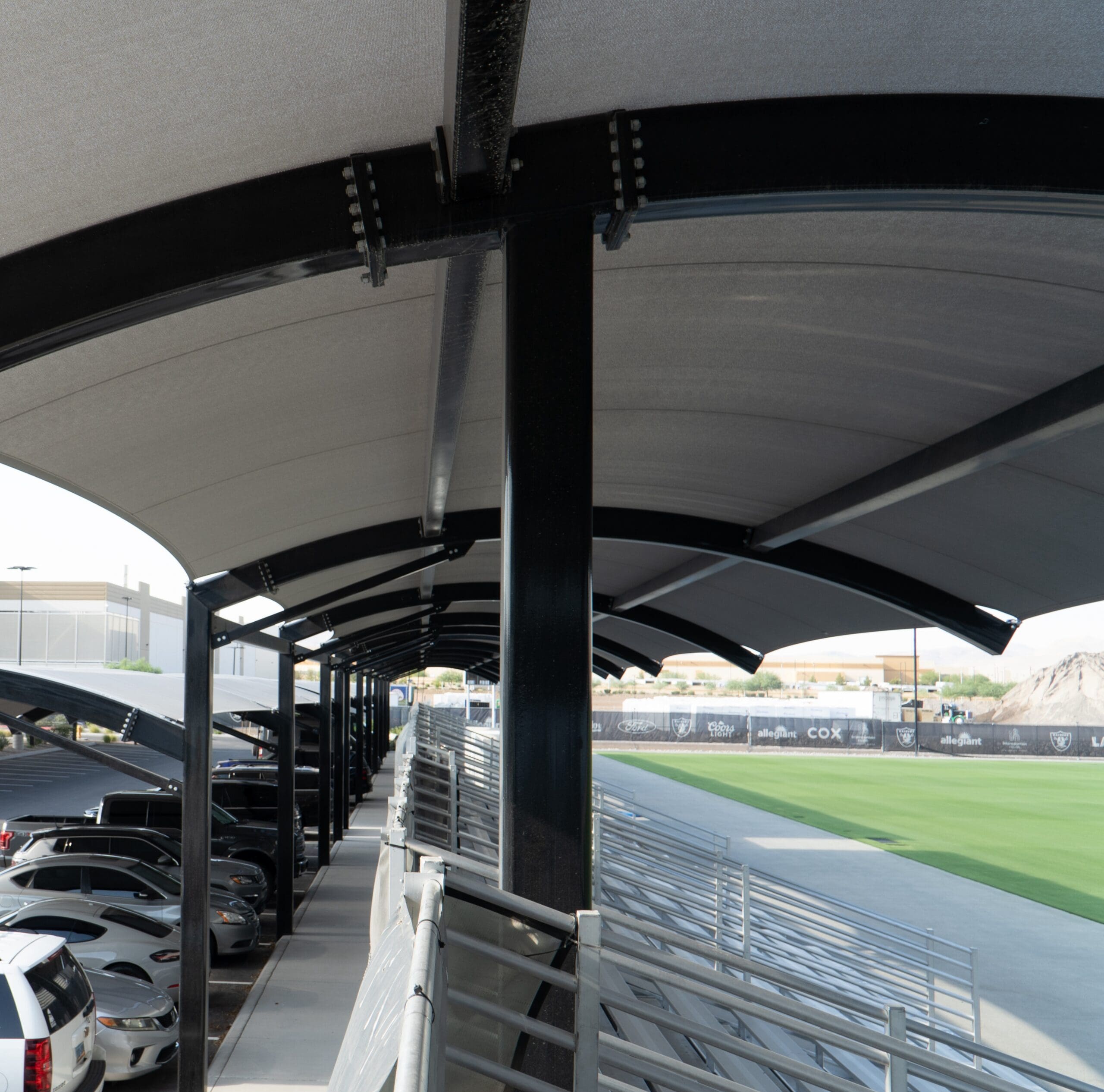 shade structure for bleachers at NFL training facility, close up view thumbnail