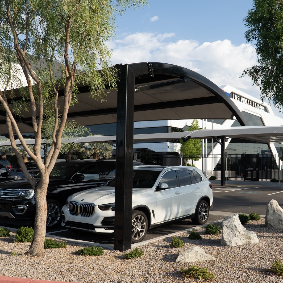 covered parking structure for the Intermountain Healthcare Performance Center in Nevada, cars parked in the shade